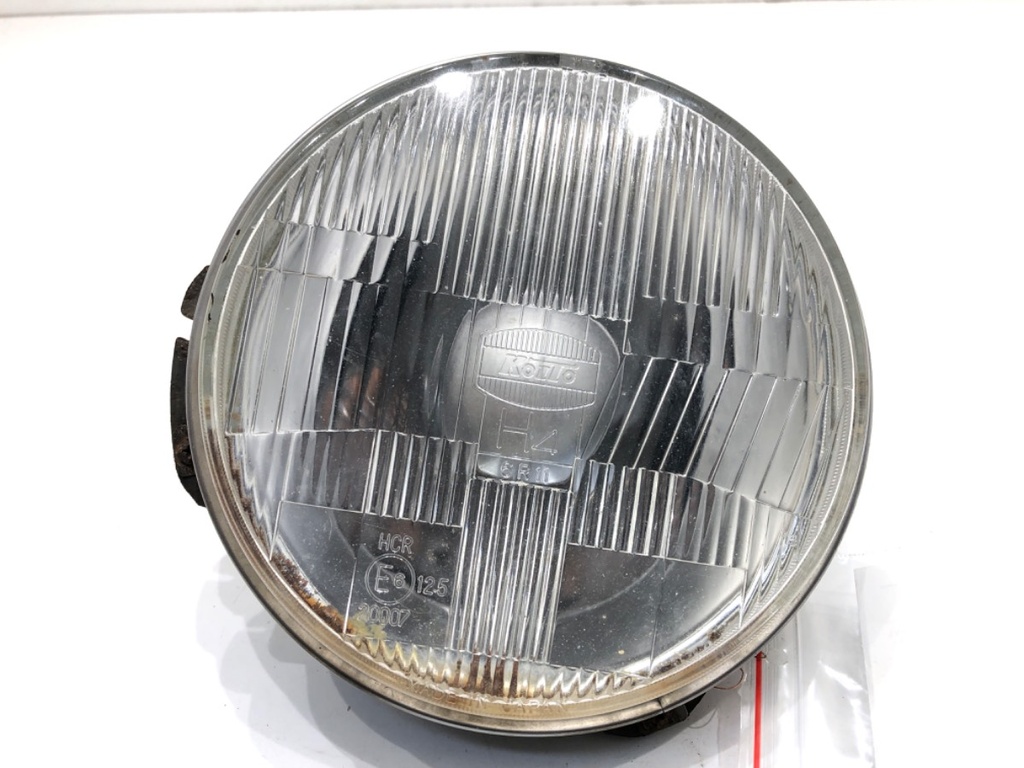 [STARK-590125] Faro delantero izquierdo Mitsubishi Pajero I (L04_G, L14_G) 1982-1991